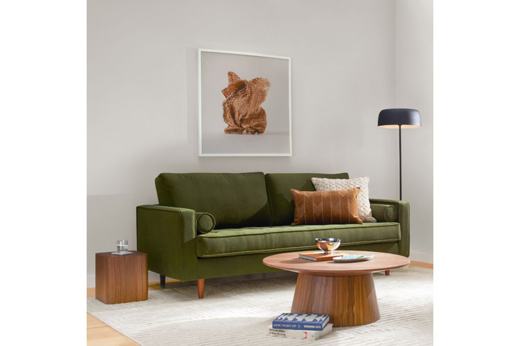 Green sofa with pillows hotsell